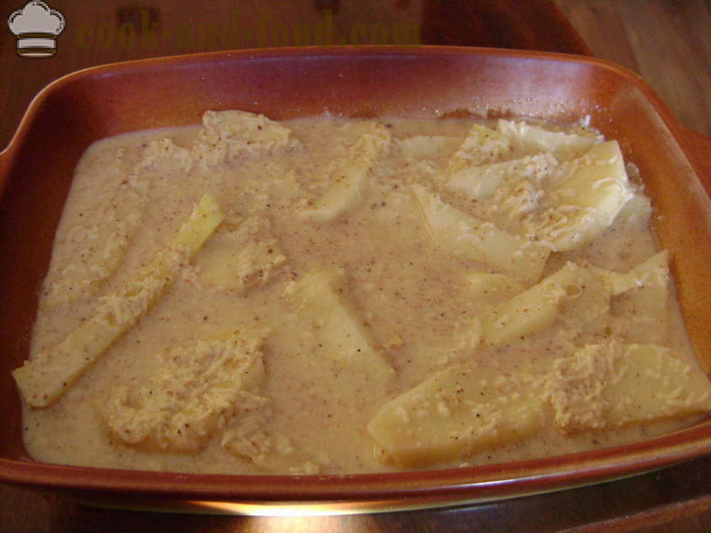 Patatas inihurnong sa cream sauce - parehong masarap na lutong patatas sa oven na may browned crust, na may isang hakbang-hakbang recipe litrato
