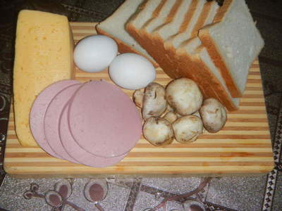 Hot sandwich na may egg sa oven - kung paano gumawa ng isang mainit na sanwits na may itlog, sausage at mushroom, isang hakbang-hakbang recipe litrato